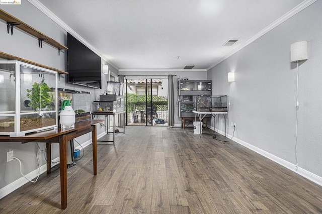 living room featuring dark wood-type flooring and crown molding