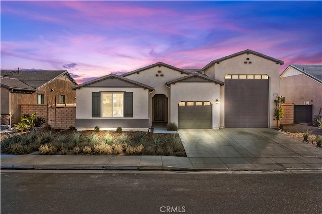 view of front of property with a garage