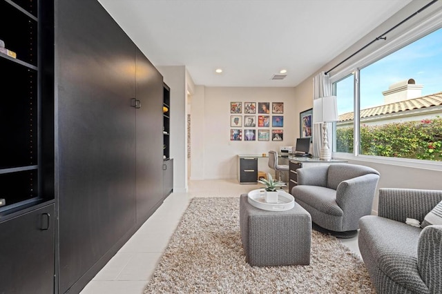 sitting room featuring light tile patterned flooring