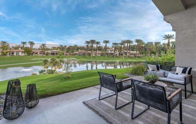 view of patio / terrace with a water view and an outdoor hangout area