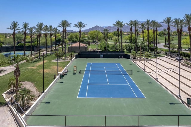 view of sport court with a mountain view