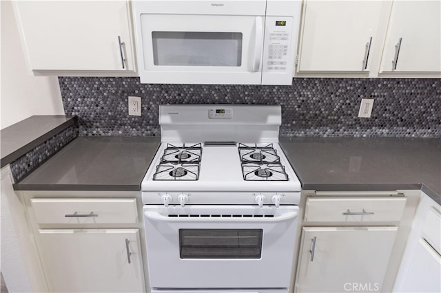 kitchen featuring white cabinets, backsplash, and white appliances