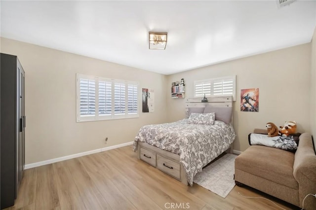 bedroom featuring light wood-type flooring