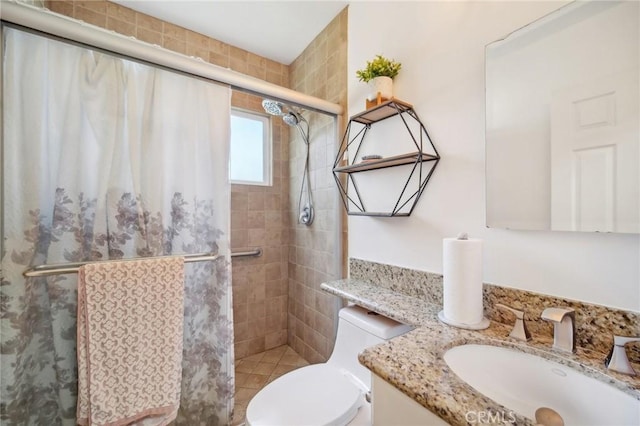 bathroom with vanity, toilet, and walk in shower