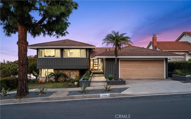 view of front of house with a garage