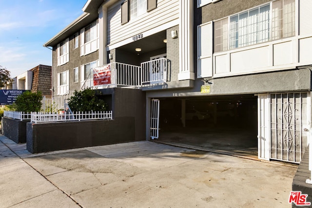 view of building exterior with a garage