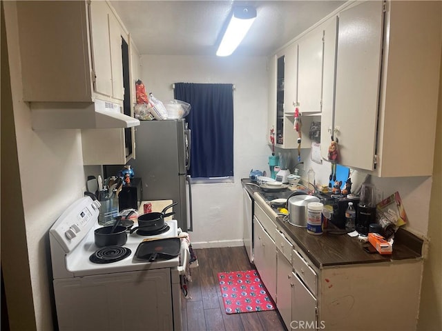 kitchen with dark hardwood / wood-style flooring, electric range, white cabinetry, and stainless steel dishwasher