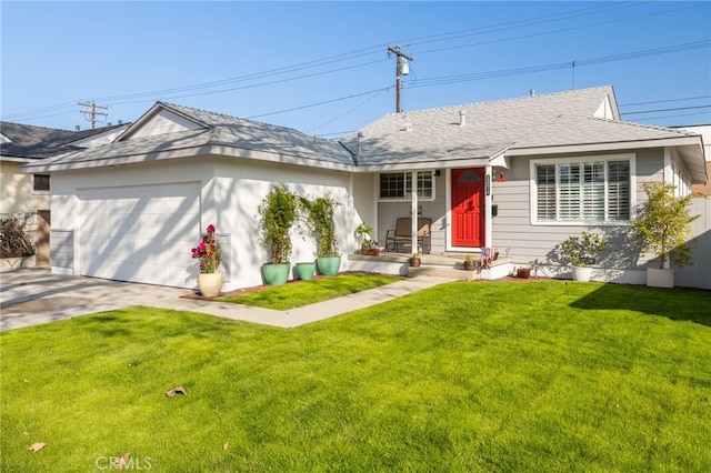 ranch-style home featuring a garage and a front lawn