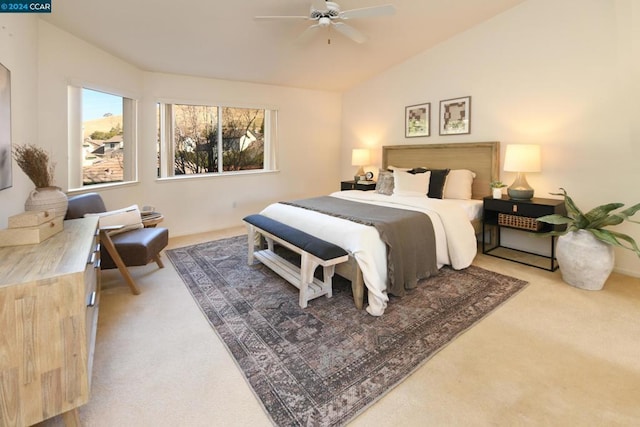 carpeted bedroom featuring ceiling fan and lofted ceiling