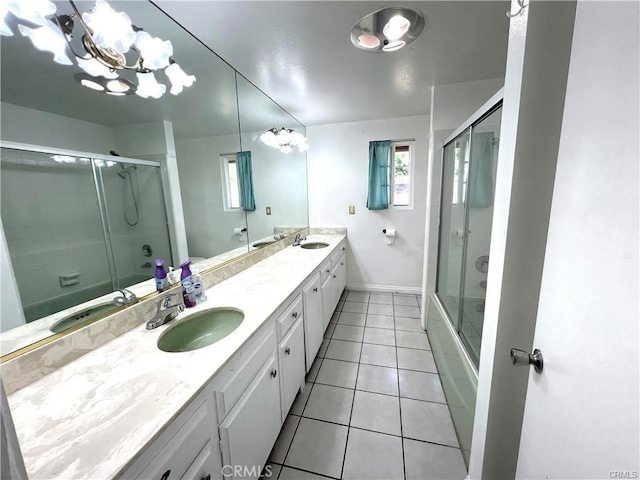 bathroom featuring shower / bath combination with glass door, vanity, and tile patterned floors