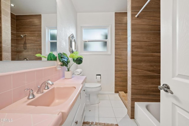 bathroom with decorative backsplash, vanity, tile patterned floors, and toilet