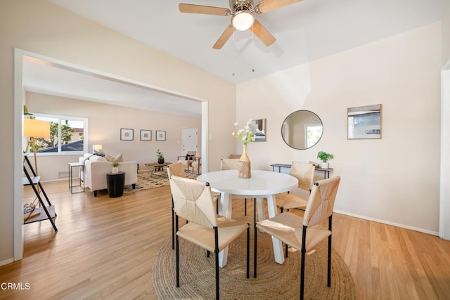 dining area featuring ceiling fan and light hardwood / wood-style floors