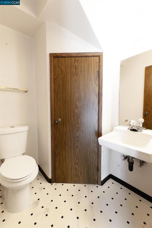 bathroom with toilet and sink