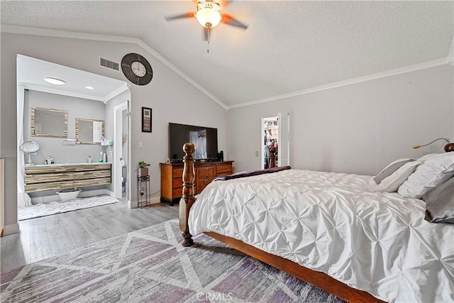 2052 Thomas Pl, West Covina, CA 91792 - bedroom with wood finished floors, vaulted ceiling, crown molding, a textured ceiling, and ceiling fan