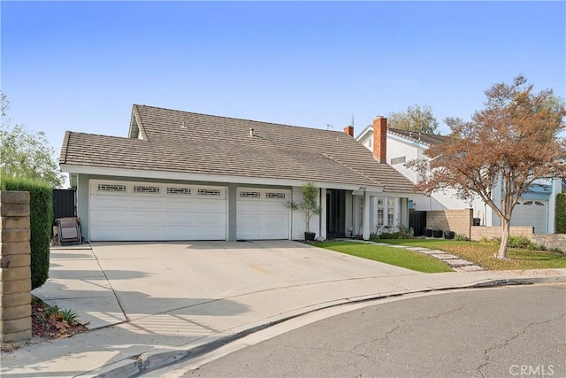 view of front of home featuring a garage