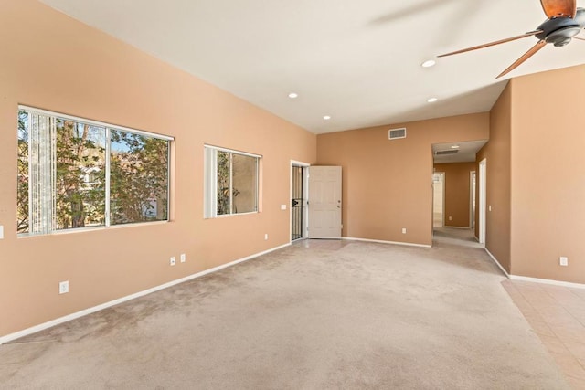 carpeted empty room with ceiling fan