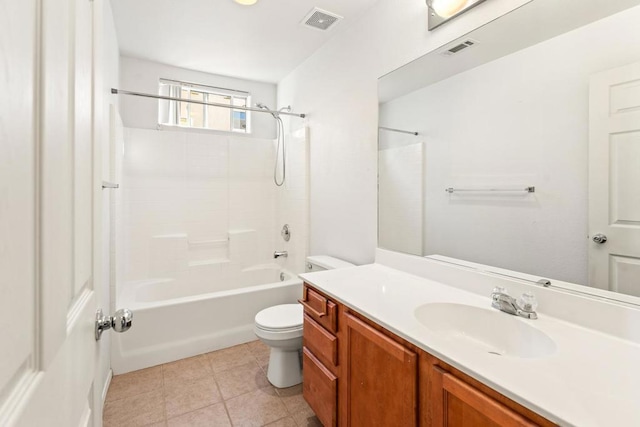 full bathroom featuring tile patterned floors, vanity, toilet, and shower / washtub combination