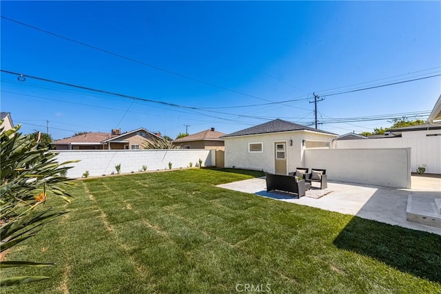 view of yard with an outdoor living space and a patio area