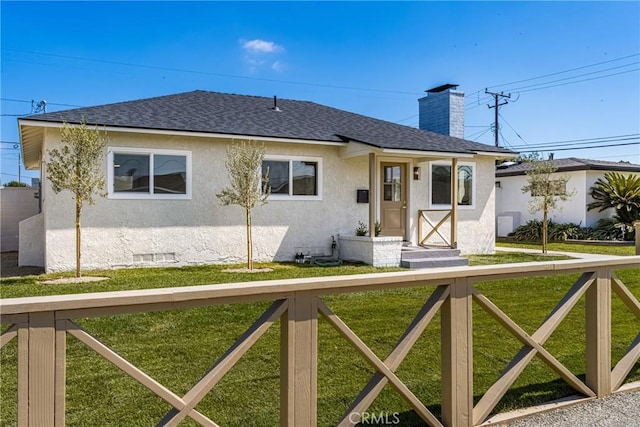 view of front of house with a front yard