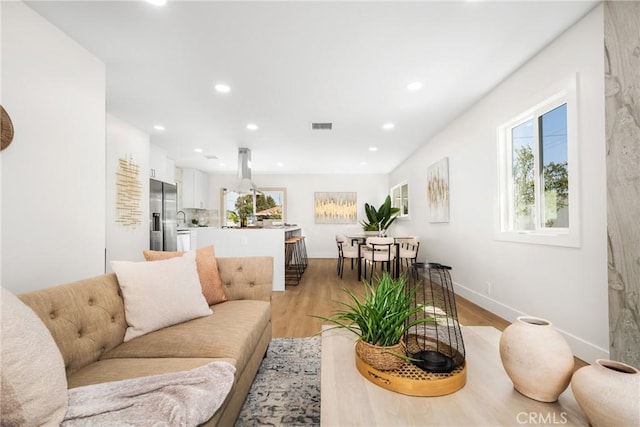 living room with light wood-type flooring