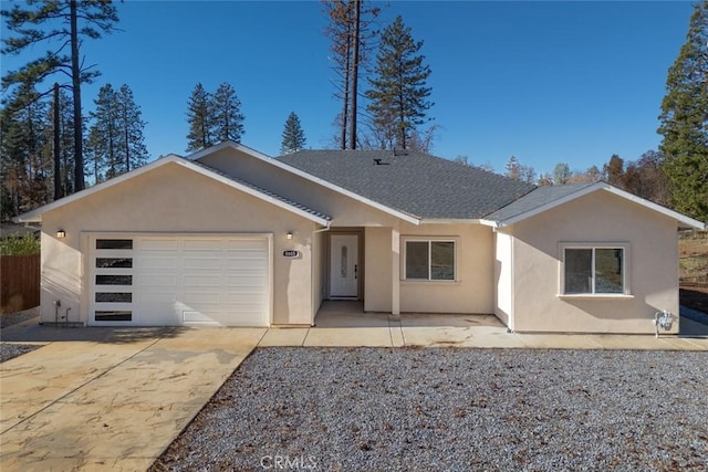 single story home featuring a garage