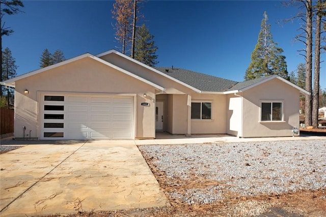 ranch-style house featuring a garage