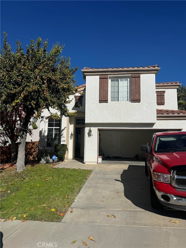 view of property featuring a garage