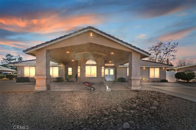 view of front of house with a patio area