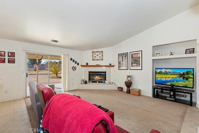 tiled living room with vaulted ceiling