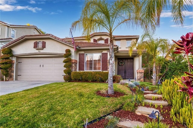 view of front of house featuring a front lawn and a garage