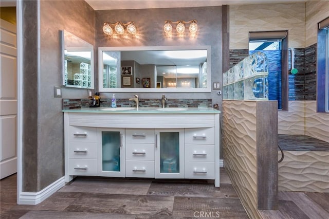 bathroom with wood-type flooring and vanity