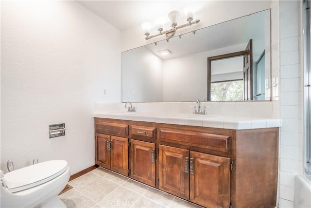 full bathroom with tile patterned flooring, vanity, toilet, and tub / shower combination