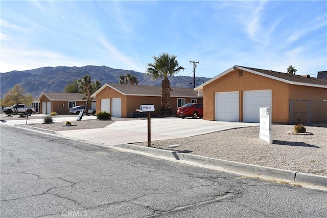 6424 Athol Ave Unit 29, Palms, CA 92277 - view of street featuring curbs and a mountain view