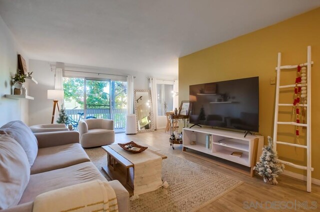 living room with hardwood / wood-style floors