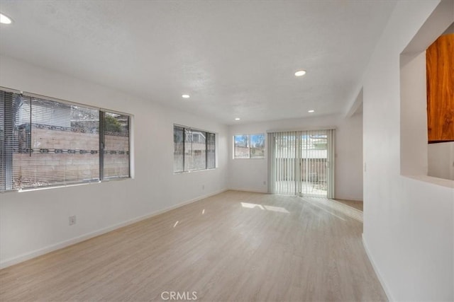 unfurnished room featuring light wood-type flooring