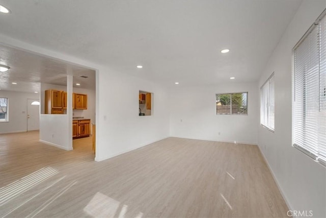 unfurnished living room featuring light hardwood / wood-style flooring