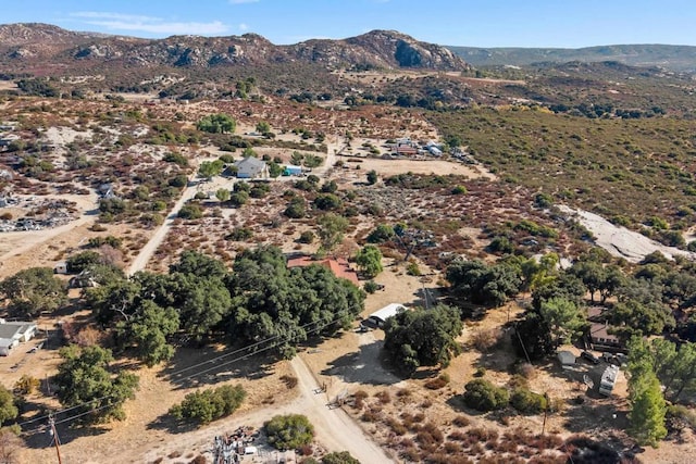 drone / aerial view featuring a mountain view