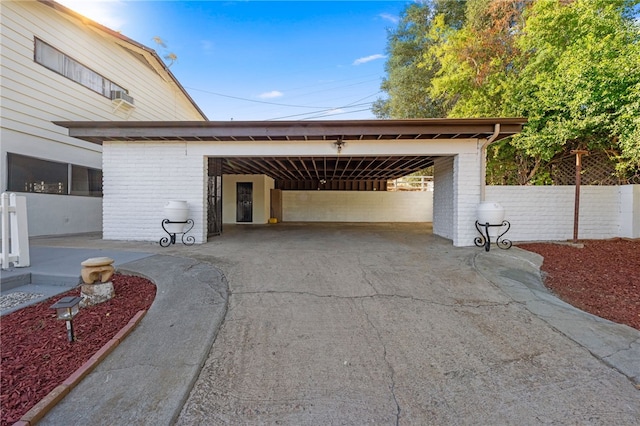 exterior space featuring a carport