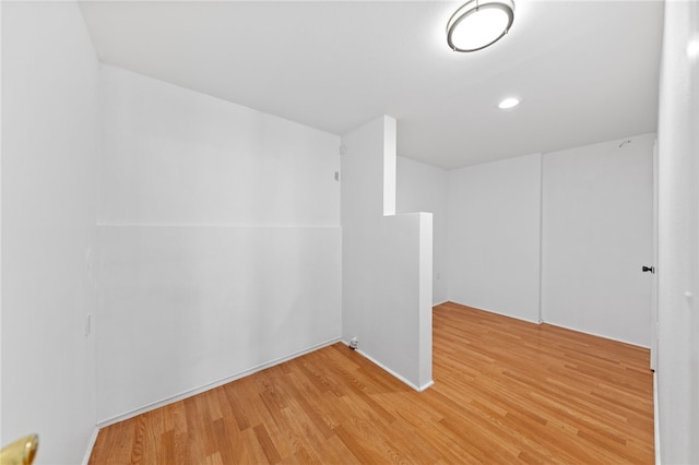 empty room featuring wood-type flooring