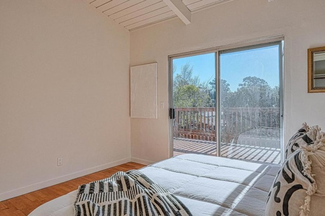 bedroom with wooden ceiling, vaulted ceiling with beams, access to outside, and hardwood / wood-style flooring