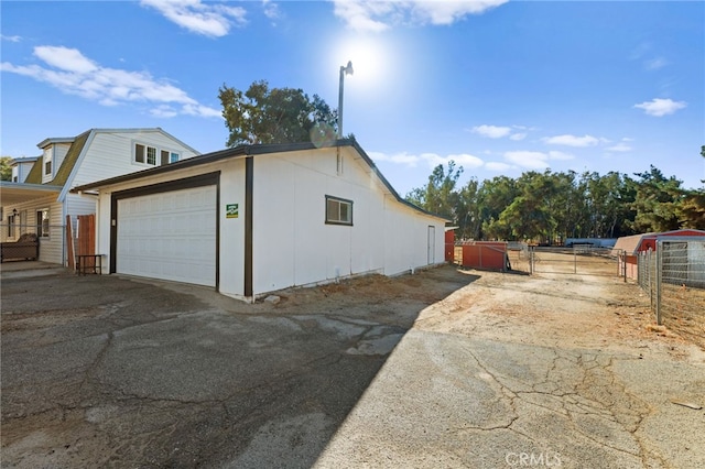 view of home's exterior featuring a garage