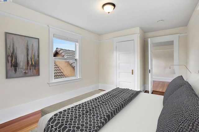 bedroom featuring hardwood / wood-style floors