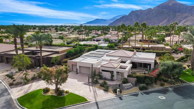 bird's eye view with a mountain view