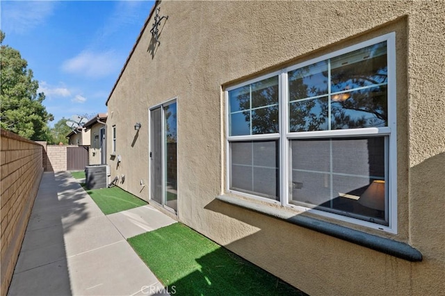 view of property exterior featuring a patio