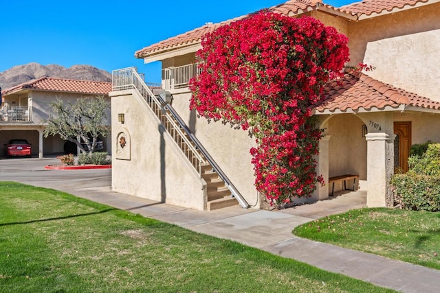 mediterranean / spanish house featuring a mountain view