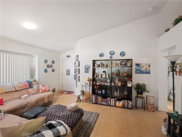 living room featuring light parquet floors and lofted ceiling