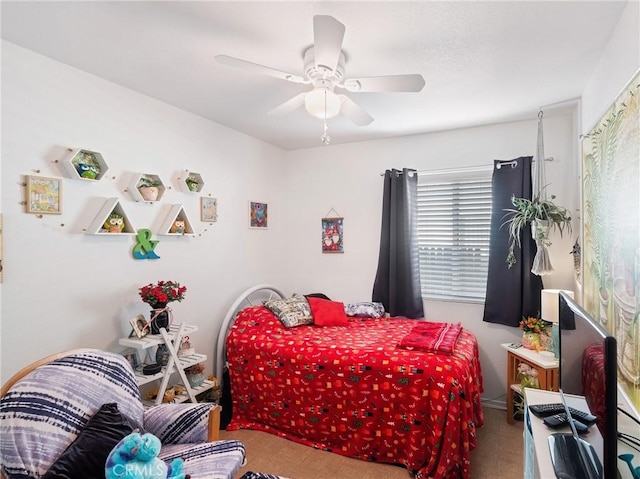 bedroom featuring ceiling fan and parquet floors