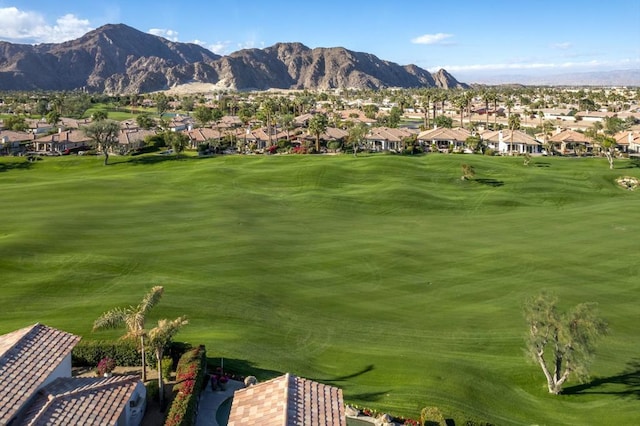 surrounding community featuring a mountain view