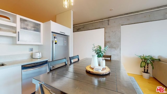 dining room featuring light hardwood / wood-style flooring