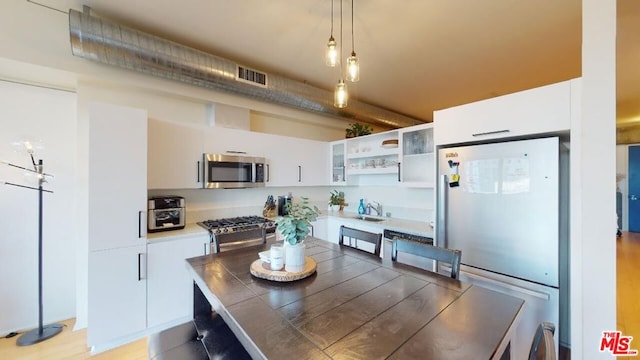 dining space with sink